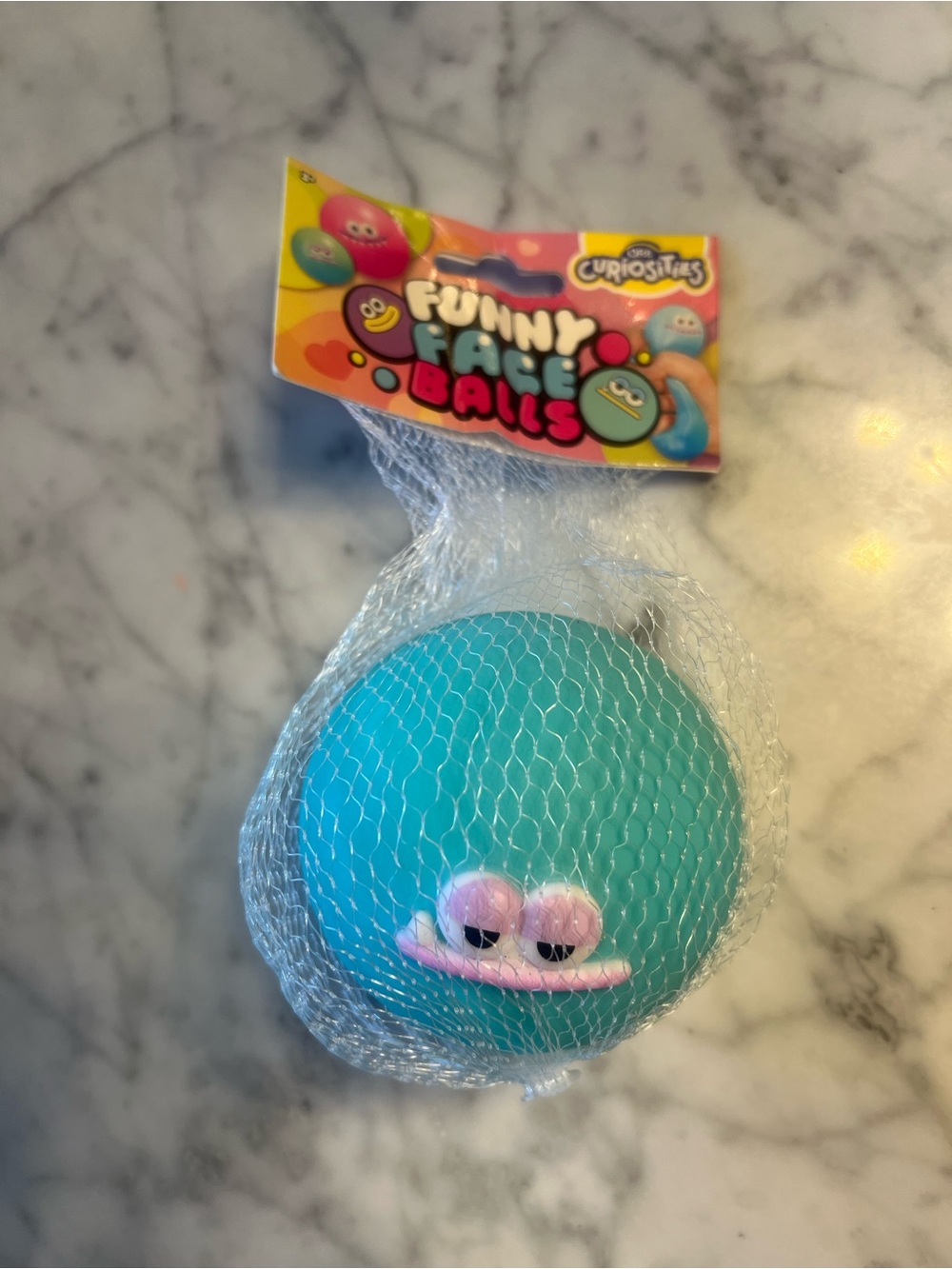 Funny Face Balls Teal Squeeze Toy -